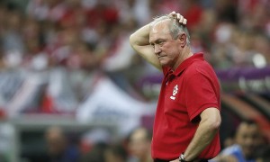 Poland's coach Franciszek Smuda reacts during their Group A Euro 2012 soccer match against Greece at the National Stadium in Warsaw, June 8, 2012. REUTERS/Pascal Lauener (POLAND - Tags: SPORT SOCCER)