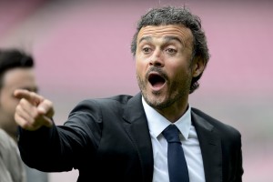 Barcelona's new coach Luis Enrique Martinez gestures during his presentation at the Camp Nou stadium in Barcelona on May 21, 2014. Barcelona on May 19 appointed their former captain and outgoing Celta Vigo manager Luis Enrique as their new coach to replace Gerardo Martino after a disappointing trophyless season, the club said. AFP PHOTO / JOSEP LAGO (Photo credit should read JOSEP LAGO/AFP/Getty Images)